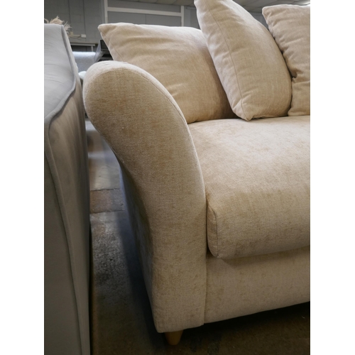 1422 - An oatmeal velvet three seater sofa