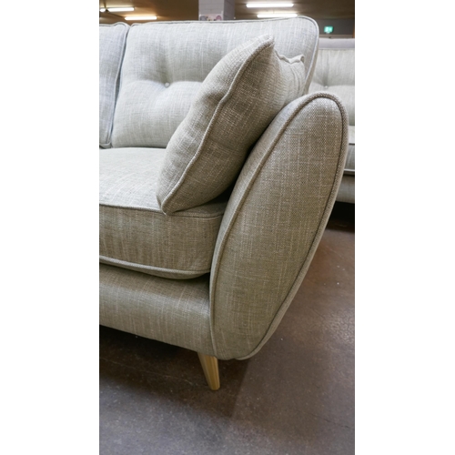 1433 - An olive fleck four seater sofa and 2.5 seater sofa