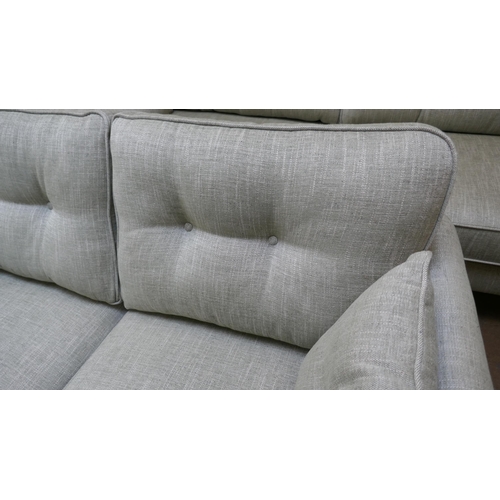 1433 - An olive fleck four seater sofa and 2.5 seater sofa