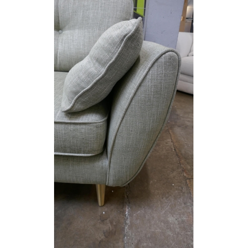 1433 - An olive fleck four seater sofa and 2.5 seater sofa