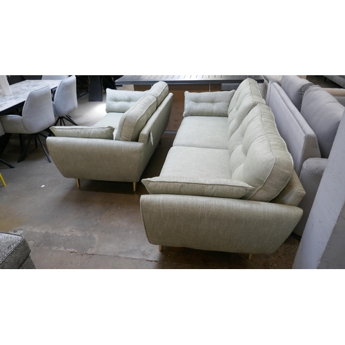 1433 - An olive fleck four seater sofa and 2.5 seater sofa