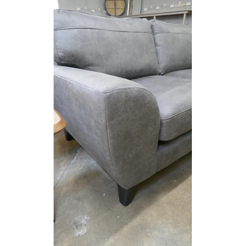 1441 - A charcoal PU leather three seater sofa