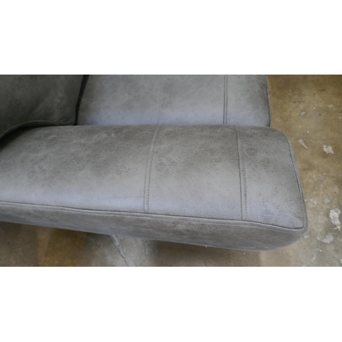 1441 - A charcoal PU leather three seater sofa