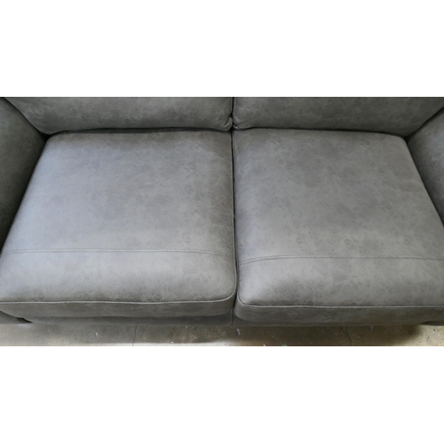 1441 - A charcoal PU leather three seater sofa