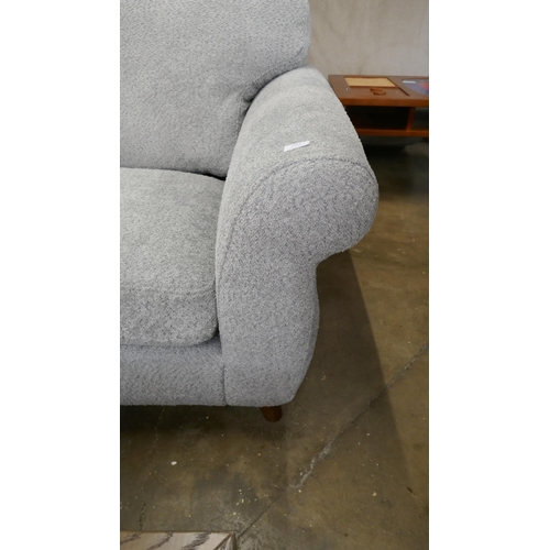 1443 - A grey flecked L shaped sofa