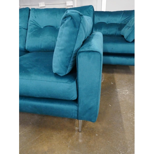 1446 - A turquoise velvet three seater sofa and two seater sofa