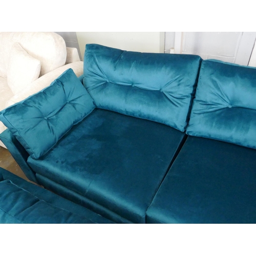 1446 - A turquoise velvet three seater sofa and two seater sofa