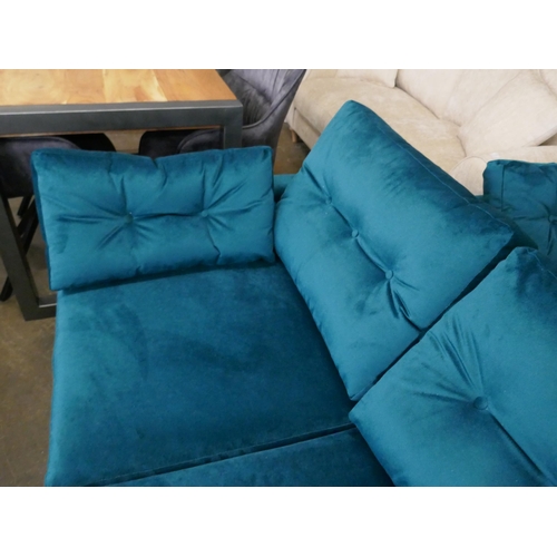 1446 - A turquoise velvet three seater sofa and two seater sofa