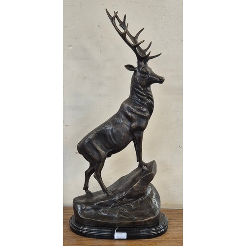 359 - A large French style bronze figure of a stag, on black marble socle