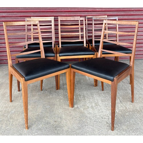 91B - A set of eight McIntosh teak dining chairs