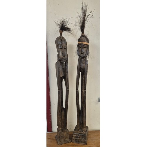 344 - Two African carved wood tribal statues