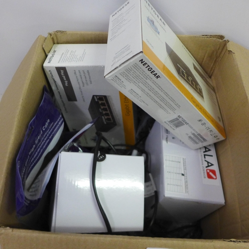 2402 - A box of assorted computing and networking items including Netgear ethernet switches