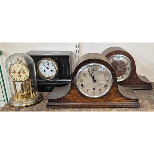 338 - A 19th Century Belge Noir mantle clock, an anniversary clock and two oak mantle clocks