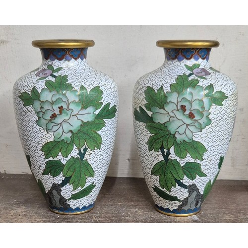 337 - A pair of small Oriental champleve enamelled vases