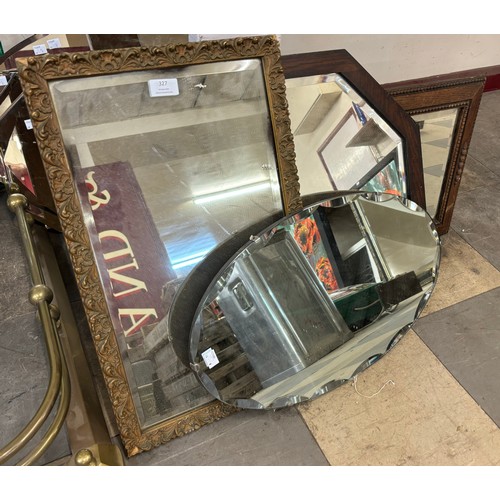 327 - Two oak framed mirrors, a gilt framed mirror and a bevelled edge mirror