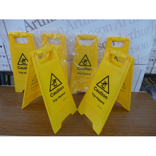 2381 - 7 'Caution Trip Hazard' floor signs