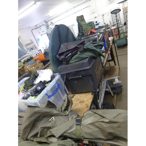 2382 - A large quantity of fishing equipment including an XPR folding chair, a Coleman baitbox, a Kiley pol... 