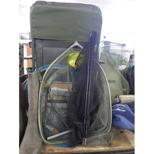 2382 - A large quantity of fishing equipment including an XPR folding chair, a Coleman baitbox, a Kiley pol... 