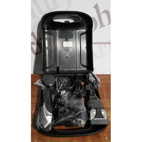 6091 - Wahl Deluxe Combi Hair Clipper Kit (328-205)* This lot is subject to vat