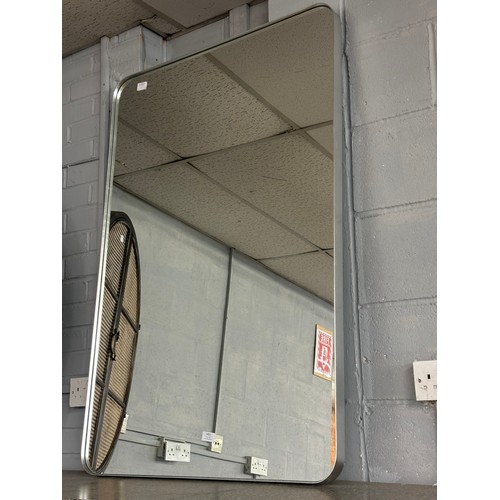 1451 - A large silver framed mirror