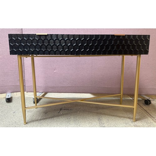 1456A - A black console table with gold legs