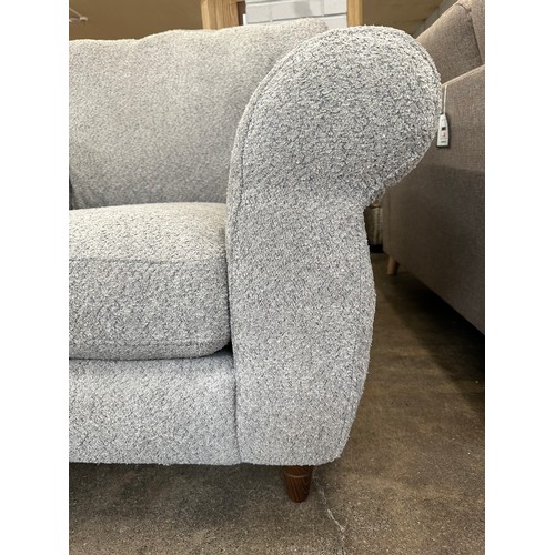 1417 - A grey flecked 2.5 seater sofa and armchair - minor frame damage to sofa