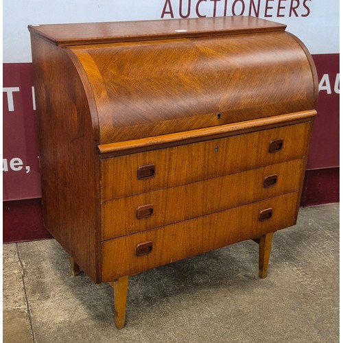 1 - A Swedish S.M.I. teak cylinder bureau, designed by Egon Ostergaard