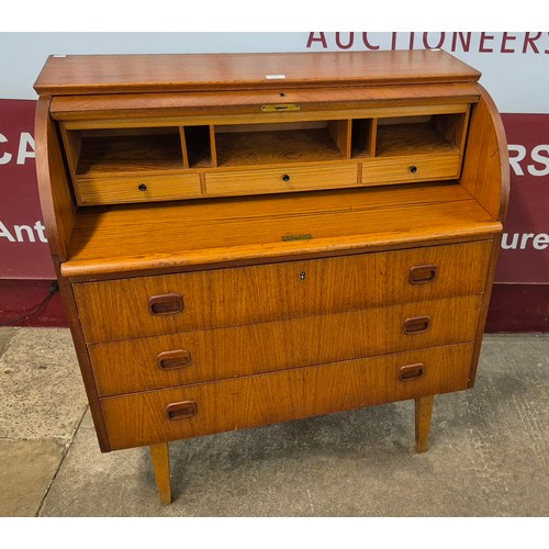 1 - A Swedish S.M.I. teak cylinder bureau, designed by Egon Ostergaard