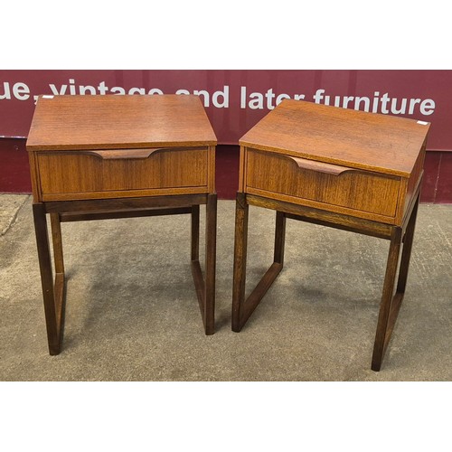 24 - A pair of Austin Suite teak bedside tables