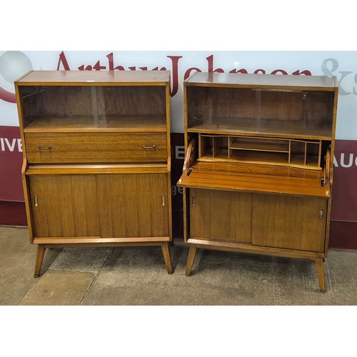 31 - A pair of walnut writing cabinets