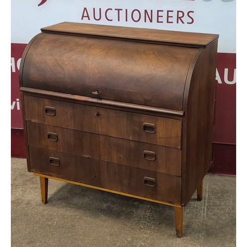 34 - A Swedish S.M.I. teak cylinder bureau, designed by Egon Ostergaard