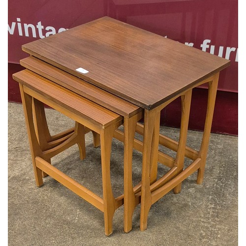 36 - A teak nest of tables