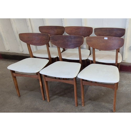 59 - A set of six teak dining chairs