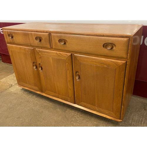 37 - An Ercol Blonde elm Windsor sideboard