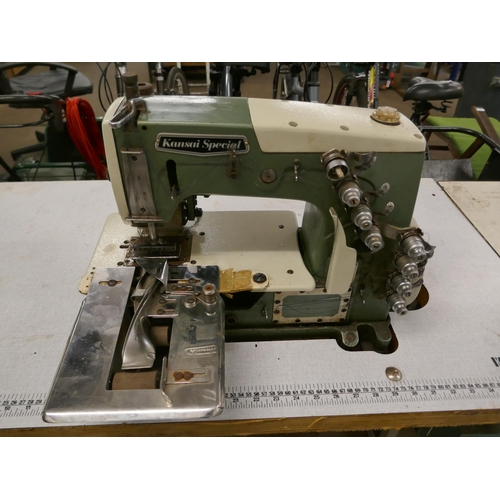 2152 - A Kansai Special model DFB-1404PMD cording and belting machine