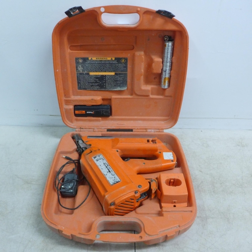 2002 - A Paslode Impulse utility framing nailer in case with battery and charger