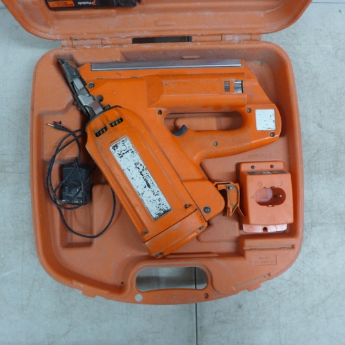 2002 - A Paslode Impulse utility framing nailer in case with battery and charger