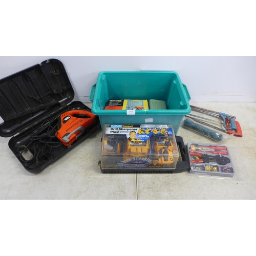 2019 - A plastic toolbox with a Black and Decker Scorpion KS890GT hand saw, a Workzone electrical repair ki... 