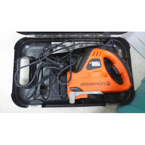 2019 - A plastic toolbox with a Black and Decker Scorpion KS890GT hand saw, a Workzone electrical repair ki... 