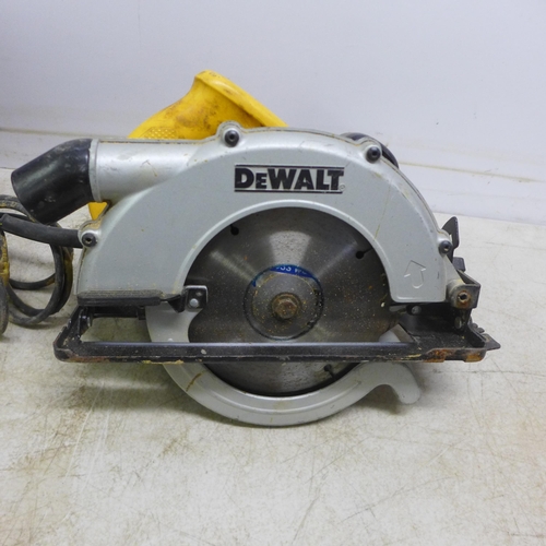 2043 - A Makita HP457D 18v drill in soft case and a Dewalt 240v D23620 power saw