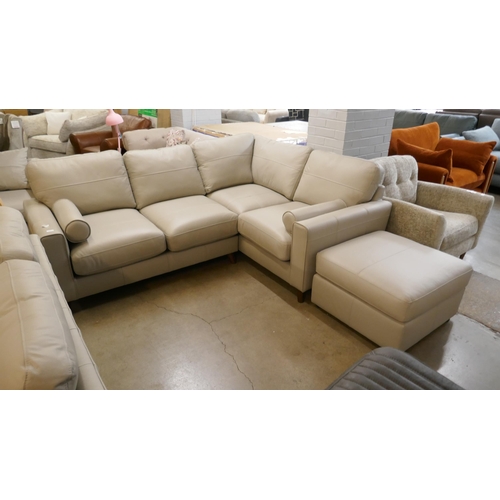 1310 - A stone leather corner sofa and footstool, brand new