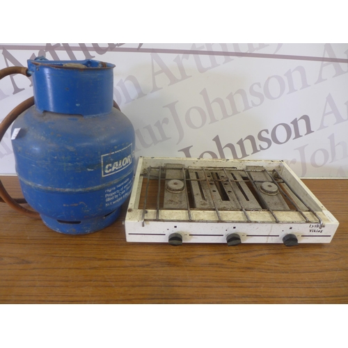 2328 - A Lytham camping stove and 12kg Calor Gas bottle