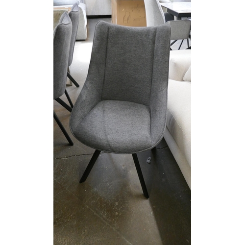 1332 - A Chennai dining table and six charcoal swivel chairs, brand new RRP £2951*This lot is subject to VA... 