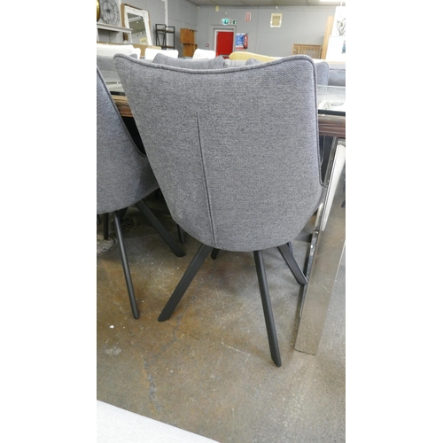 1332 - A Chennai dining table and six charcoal swivel chairs, brand new RRP £2951*This lot is subject to VA... 