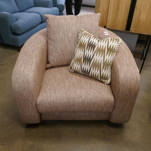 1340 - A brick upholstered swivel armchair, brand new