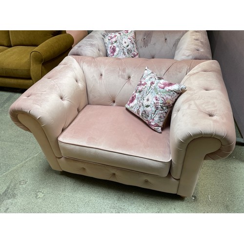 1368 - A lilac velvet cuddle chair, brand new RRP £919