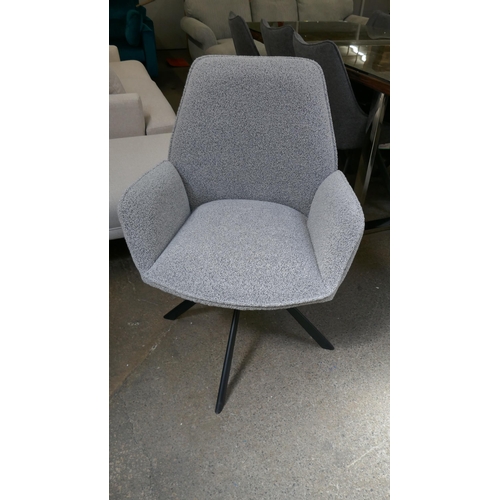 1308 - A ceramic/marble extending dining table and six grey swivel chairs, brand new *This lot is subject t... 