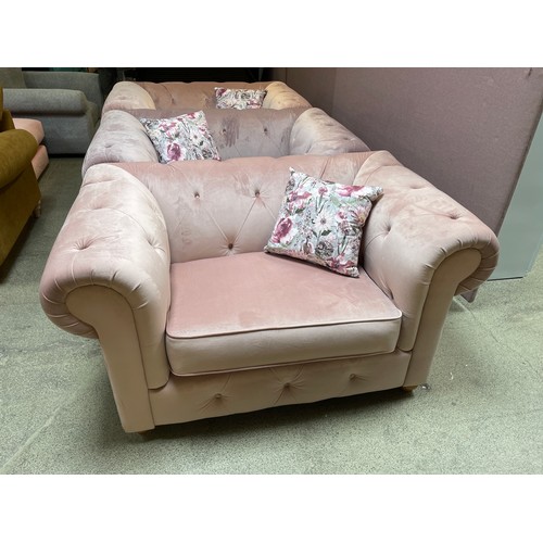 1456 - A pink velvet cuddle chair, brand new, RRP £919