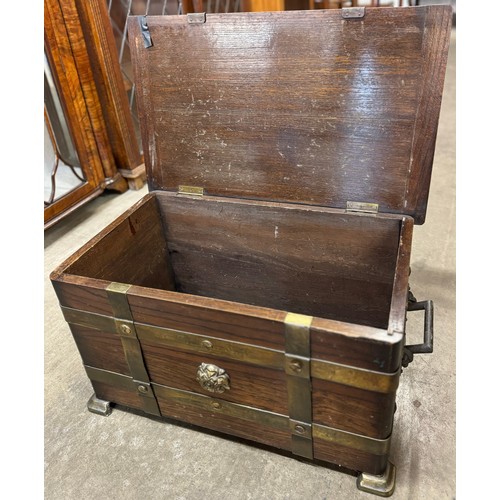 144 - An early 20th Century oak and brass mounted chest