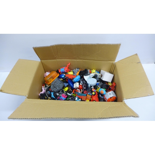 2075 - A large box of children's small toy items including McDonald's toys, cars, animals, dolls, etc.